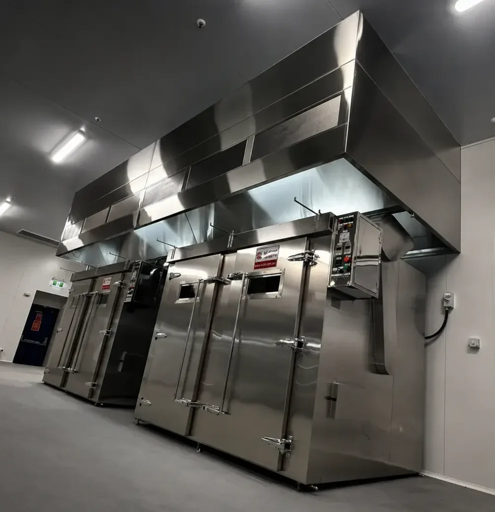 Chef working under commercial ventilation hood