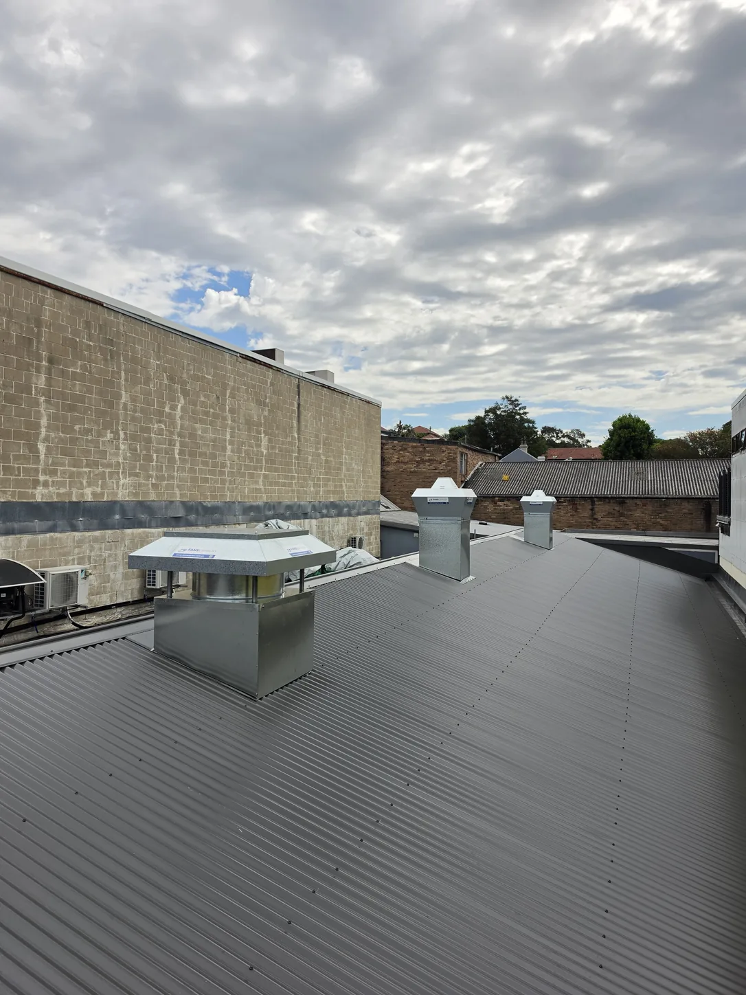 Rooftop exhaust canopy and ductwork installation